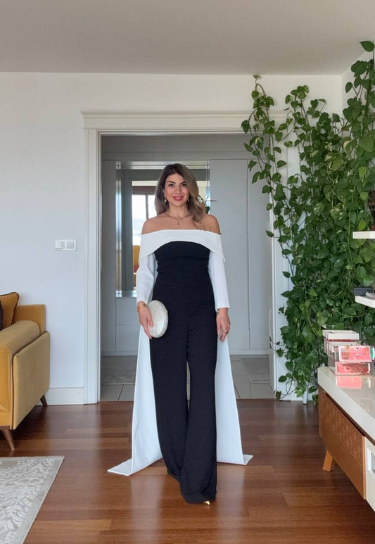 OMUZ AÇIKLIKLI KAPÜŞON DETAYLI ELEGAN SİYAH TULUM – SİYAH / BEYAZ