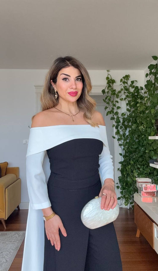 OMUZ AÇIKLIKLI KAPÜŞON DETAYLI ELEGAN SİYAH TULUM – SİYAH / BEYAZ